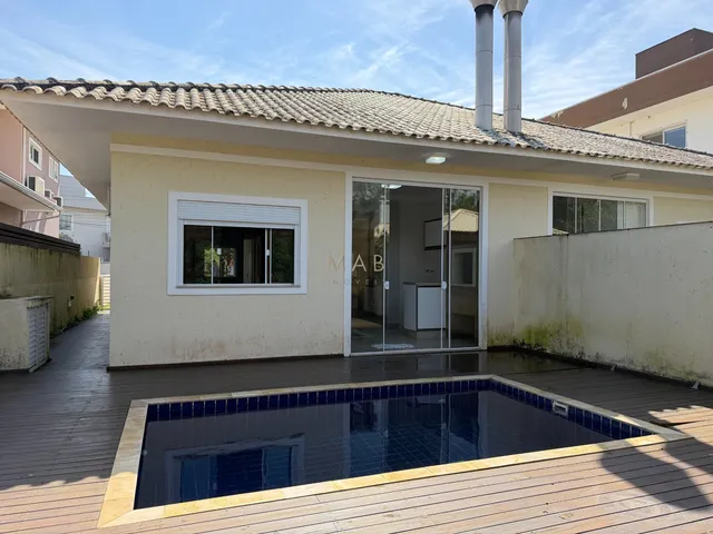 Imagem 10: Casa térrea com 2 dormitórios, sendo 1 suíte, piscina privativa, espaço gourmet e