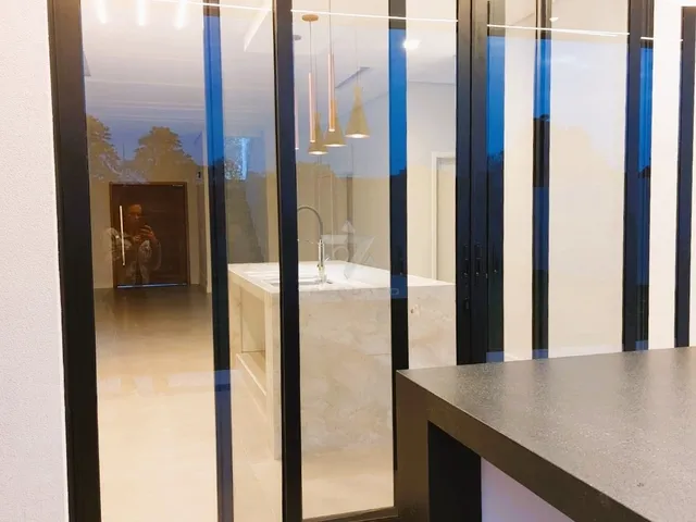Imagem 6: Sofisticação e Conforto: Sobrado no Residencial Lago Azul