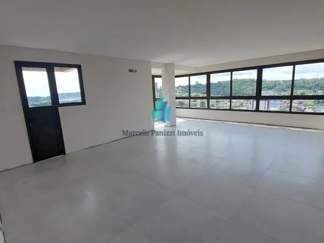 Imagem: O apartamento possui 2 Dormitórios, 1 Suíte, 2 Banheiros,