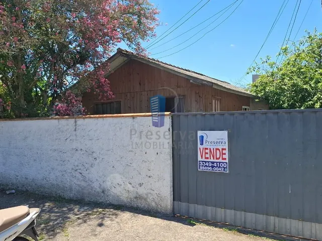 Imagem: Terreno com Duas Casas de Madeira para Venda!