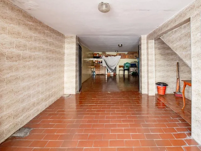 Imagem 2: Este sobrado de 187 m², localizado na charmosa Chácara Inglesa, oferece uma planta