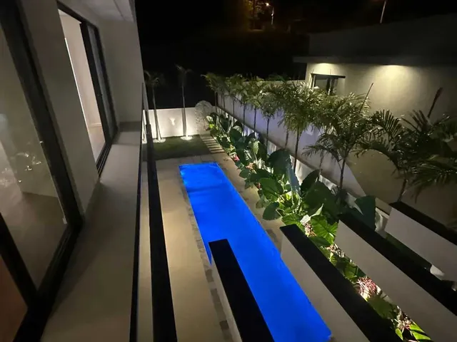 Imagem 12: Casa com 3 dormitórios sendo 3 suítes e 4 vagas de garagem em São José/SC