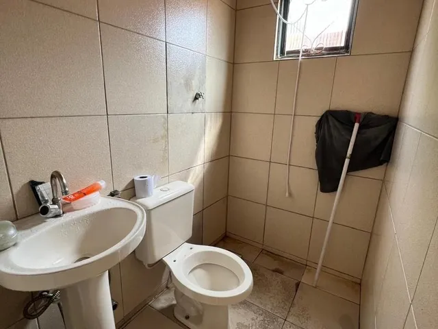 Imagem 7: Casa com grande potencial em lote amplo - Ideal para quem busca espaço e