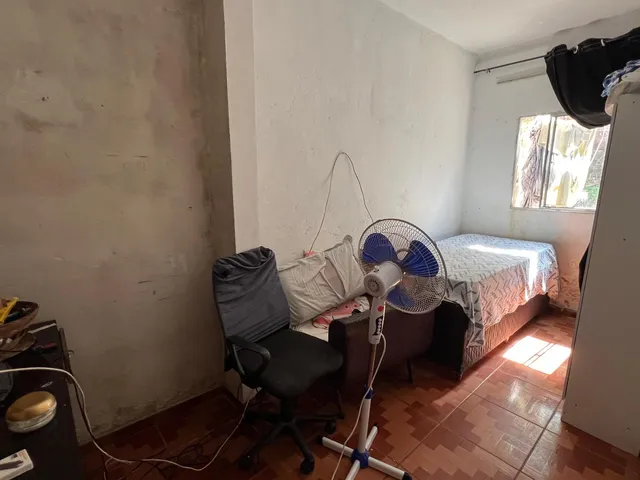 Imagem 12: Imóvel residencial localizado em lote amplo com 480 m², oferecendo excelente espaço
