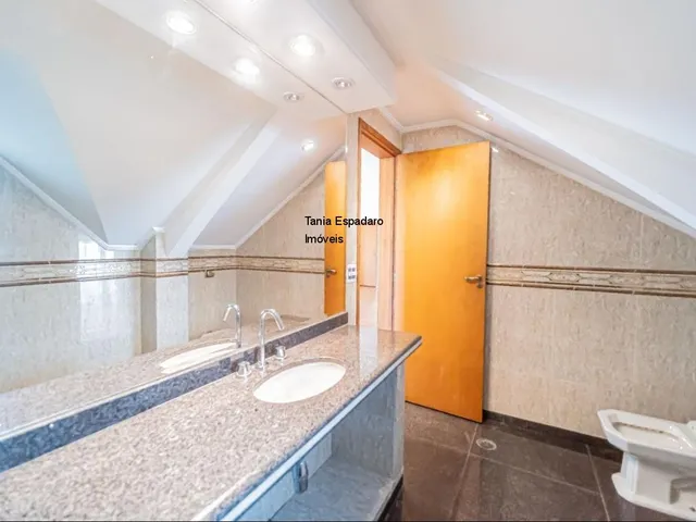 Imagem 12: Esta magnífica e imponente residência localizada no prestigiado Jardim Passárgada é o