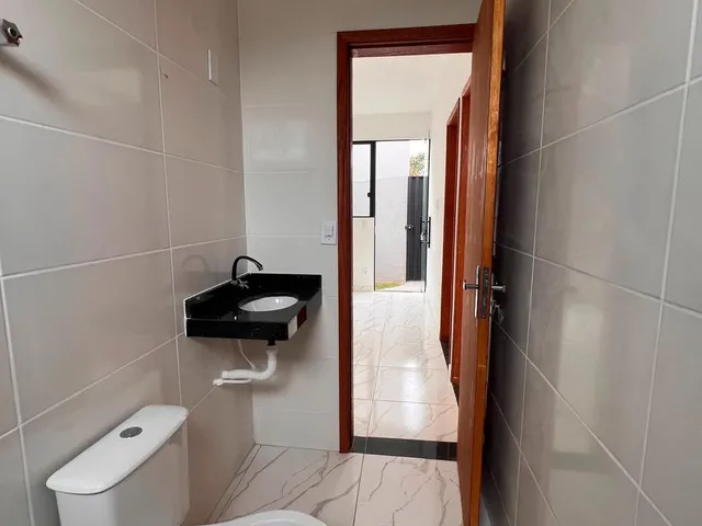 Imagem 8: Apresentamos esta excelente casa geminada, ideal para quem busca conforto, praticidade e