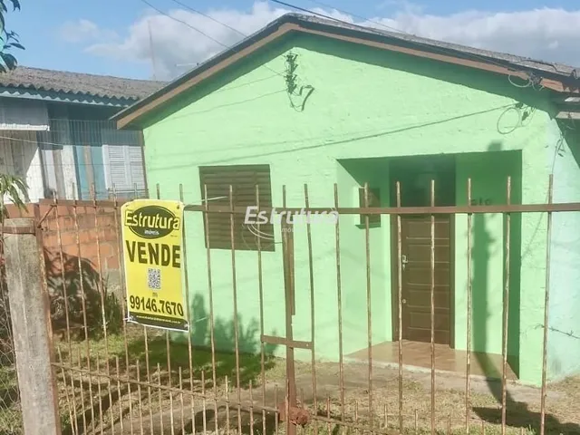 Imagem: A casa possui 2 Dormitórios, 1 Banheiro, 1 Vaga na