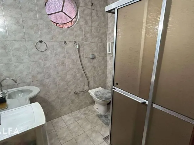 Imagem 15: Casa à Venda no Caminho Novo – Conforto, Espaço e Potencial de Ampliação
