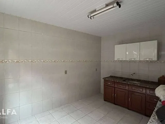 Imagem 10: Casa à Venda no Caminho Novo – Conforto, Espaço e Potencial de Ampliação