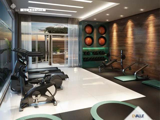 Imagem 11: Um empreendimento com ampla sacada, área de lazer mobiliada e decorada com revestimento
