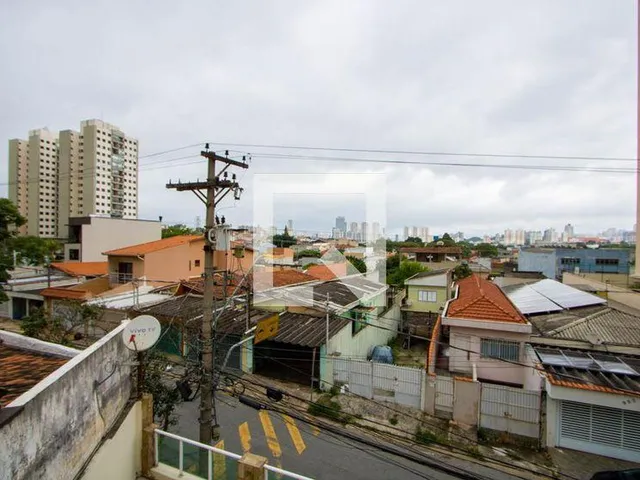 Imagem 7: Localizada no charmoso bairro de Vila Valparaíso, esta casa oferece uma excelente