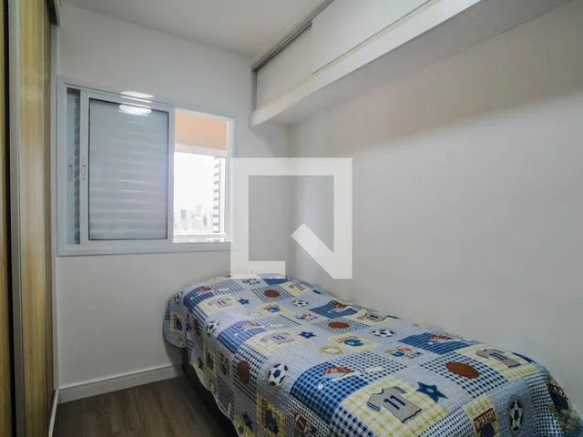 Imagem 4: Este espaçoso apartamento está localizado na vibrante cidade de Santo André. Com três