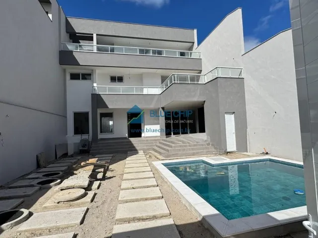 Imagem: A casa possui 4 Dormitórios, 5 Suítes, 6 Banheiros, 2