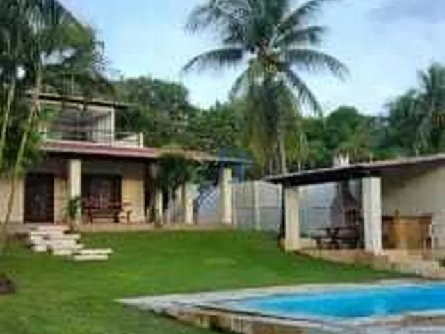 Imagem: Casa em cotovelo - Casa Duplex em cotovelo
