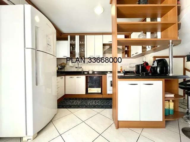 Imagem 15: 03 dormitórios, sendo uma suíte, sacada, estar íntimo no 2º pavimento, sala de estar