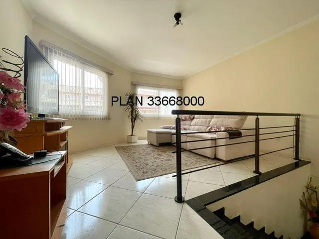 Imagem 2: 03 dormitórios, sendo uma suíte, sacada, estar íntimo no 2º pavimento, sala de estar