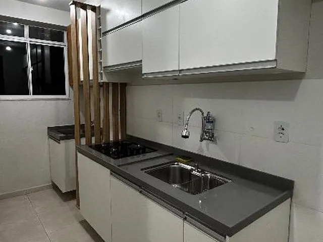 Imagem: O apartamento possui 2 Dormitórios, 1 Suíte, 2 Banheiros,