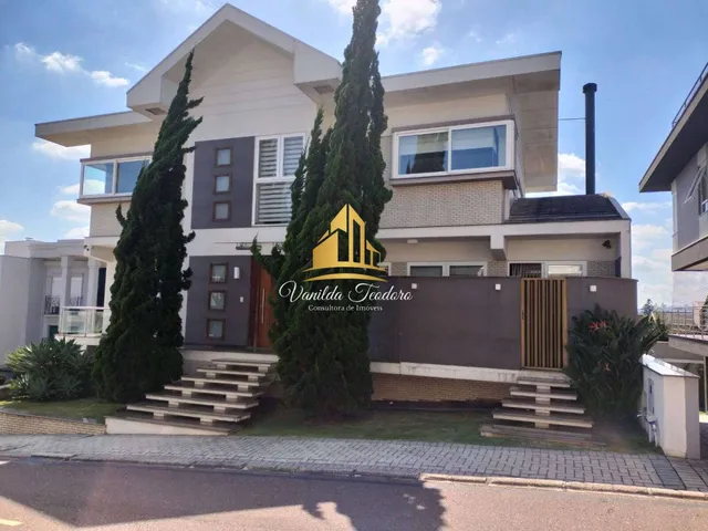 Imagem 4: Casa maravilhosa em condomínio alto padrão, construída em 2 terrenos, 3 suítes, 5