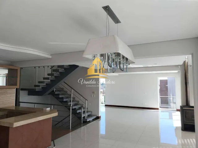 Imagem 6: Casa maravilhosa em condomínio alto padrão, construída em 2 terrenos, 3 suítes, 5