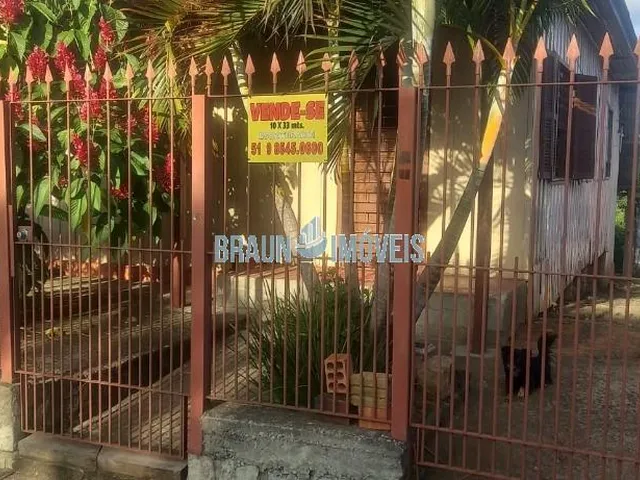 Imagem 1: Terreno 10X33 em Cachoeirinha com Casa de Madeira com 3 Quartos, 2 Salas Amplas na Parada 51