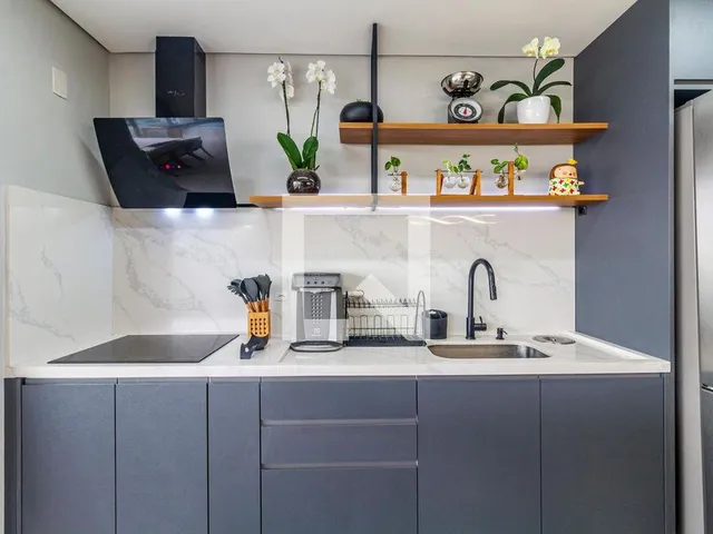 Imagem 12: Este espaçoso apartamento mobiliado, localizado no charmoso bairro do Sumaré, oferece