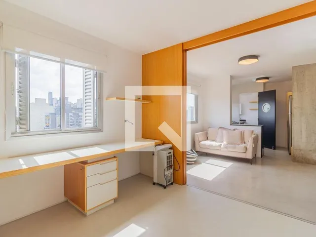 Imagem 3: Localizado no vibrante bairro de Pinheiros, em São Paulo, este apartamento oferece uma
