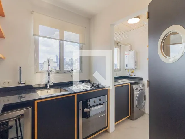 Imagem 8: Localizado no vibrante bairro de Pinheiros, em São Paulo, este apartamento oferece uma