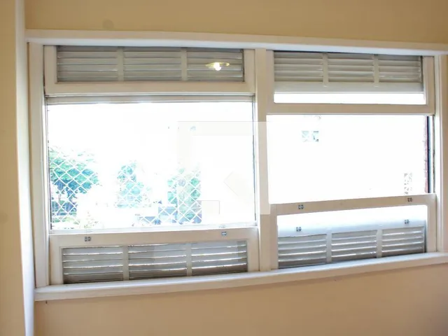 Imagem 15: Explore este espaçoso apartamento localizado no charmoso bairro de Higienópolis. Com