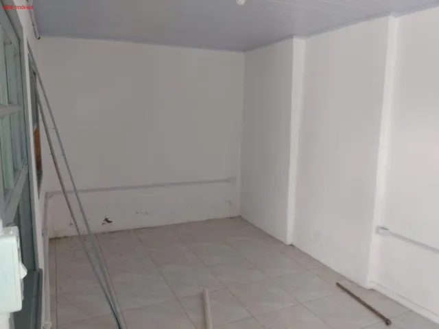 Imagem 11: Casa térrea e primeiro piso para venda. No térreo 07 peças a primeira da frente com