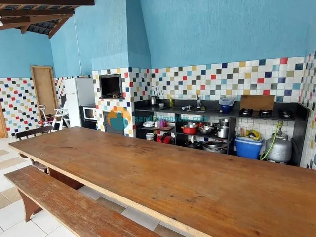 Imagem 8: Ampla casa completamente climatizada, com 5 dormitórios, área de lazer com piscina