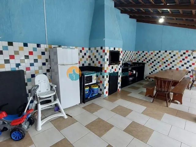 Imagem 11: Ampla casa completamente climatizada, com 5 dormitórios, área de lazer com piscina