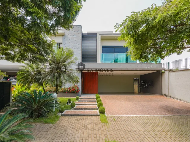 Imagem: A casa em condomínio possui 4 Dormitórios, 4 Suítes, 5