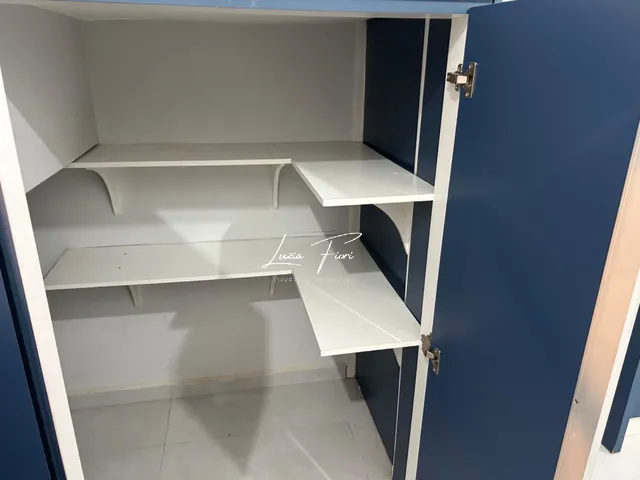 Imagem 13: Sobrado geminado com área de festas e escritório na parte externa, semi-mobiliado, à