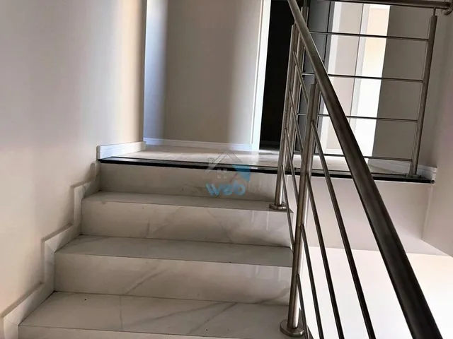 Imagem 15: Sobrado com três quartos no Bairro ITATIAIA, pronto para financiar, contando com 3