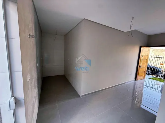Imagem 6: Sobrado com três quartos no Bairro ITATIAIA, pronto para financiar, contando com 3