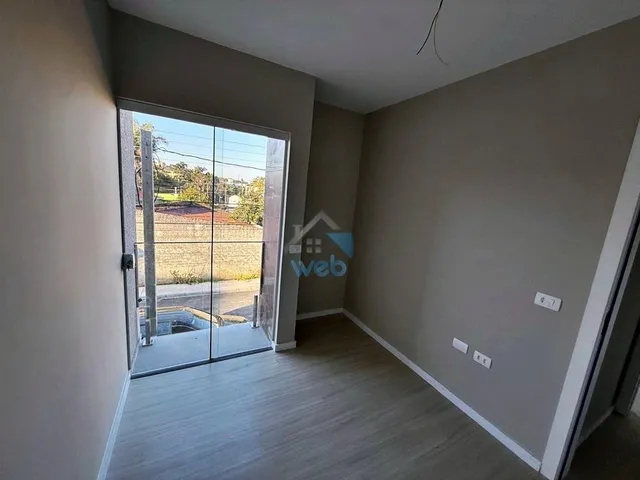 Imagem 3: Sobrado com três quartos no Bairro ITATIAIA, pronto para financiar, contando com 3