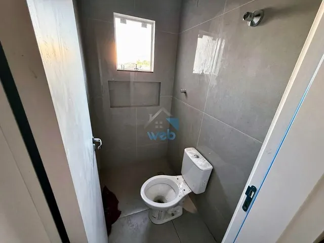 Imagem 5: Sobrado com três quartos no Bairro ITATIAIA, pronto para financiar, contando com 3