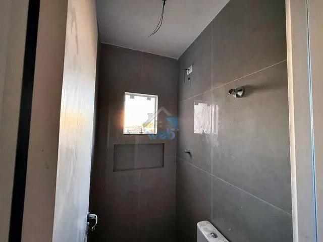 Imagem 9: Sobrado com três quartos no Bairro ITATIAIA, pronto para financiar, contando com 3