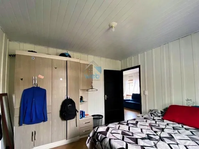 Imagem 11: Casa à venda no bairro Fazendinha, três quartos, sala, espaço externo, churrasqueira