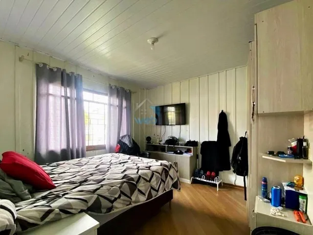 Imagem 12: Casa à venda no bairro Fazendinha, três quartos, sala, espaço externo, churrasqueira
