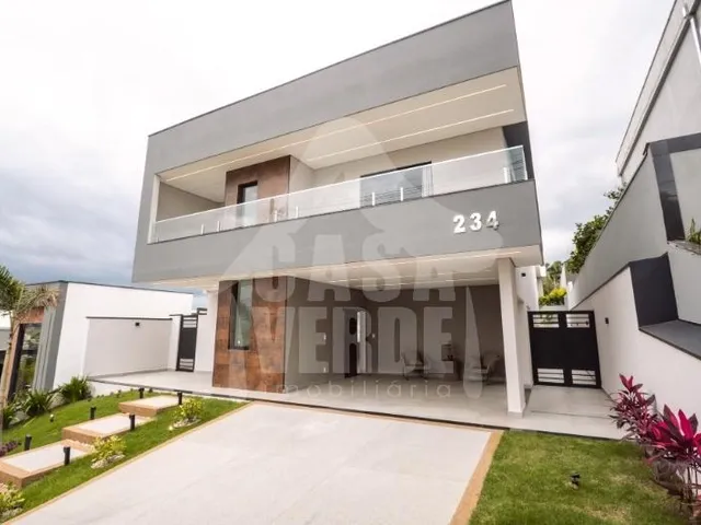 Imagem: A casa possui 3 Dormitórios, 3 Suítes, 5 Banheiros, 4