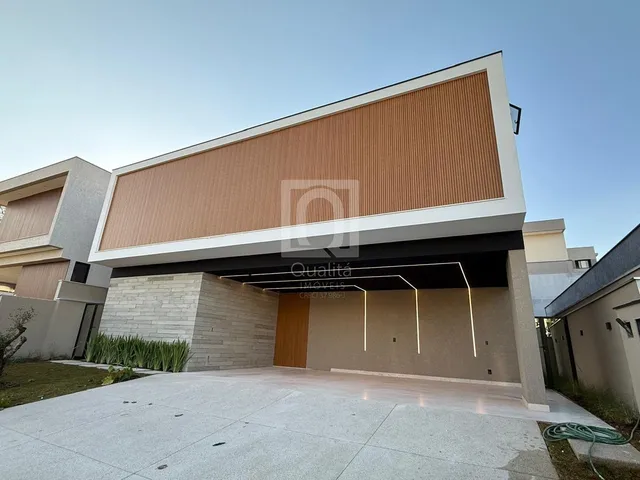 Imagem: A casa em condomínio possui 4 Dormitórios, 4 Suítes, 5