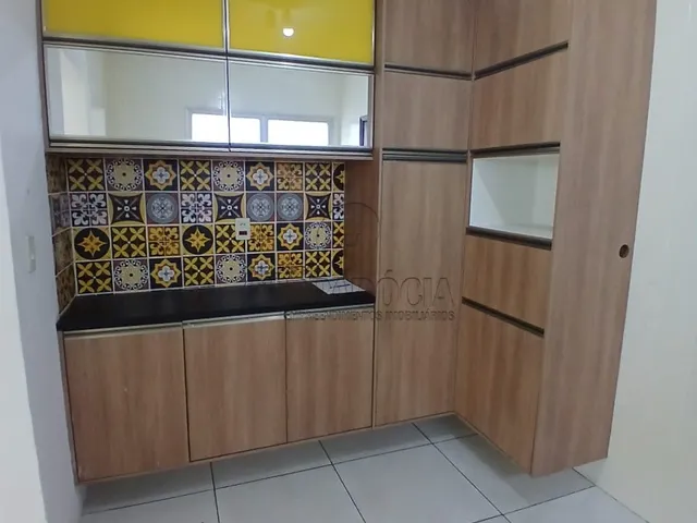 Imagem: O apartamento possui 2 Dormitórios, 1 Suíte, 2 Banheiros,