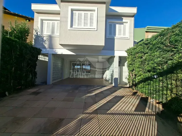 Imagem: Casa com 4 suítes e piscina à venda no