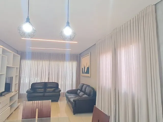 Imagem 2: Casa moderna de 4 suítes no Condomínio Riviera Green com porteira fechada e 200 m²
