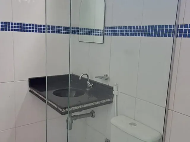 Imagem 3: Casa moderna de 4 suítes no Condomínio Riviera Green com porteira fechada e 200 m²
