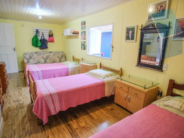 Imagem 16: Casa Amarela com 6 dormitórios de Frente para o Mar - Pé na areia