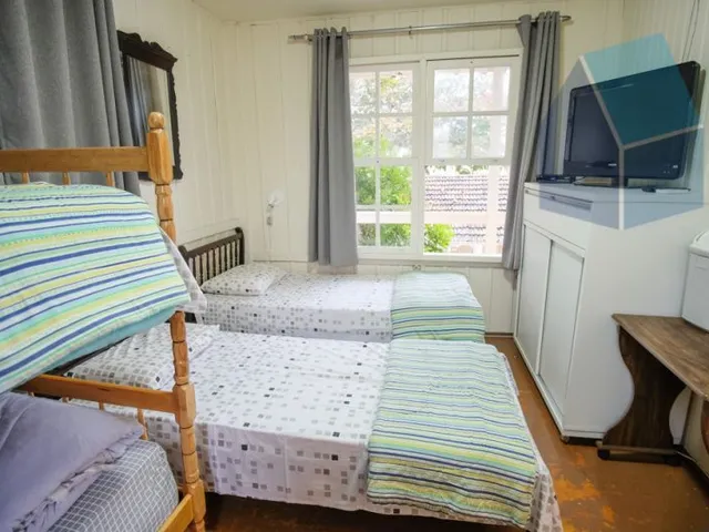 Imagem 11: Casa Amarela com 6 dormitórios de Frente para o Mar - Pé na areia