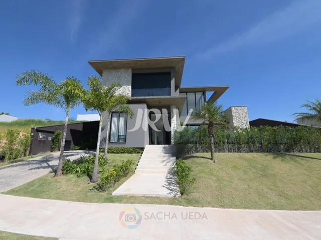 Imagem: A casa em condomínio possui 4 Dormitórios, 4 Suítes, 4