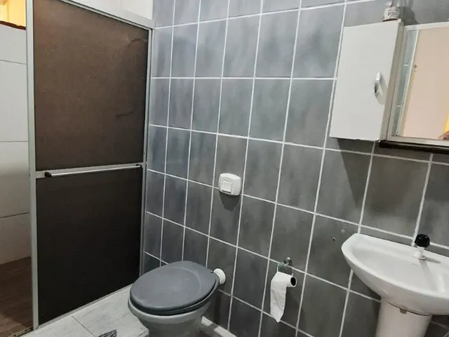Imagem 14: Imperdível casa à venda em Guarapari-ES, bairro Meaípe: 5 quartos, 2 suítes, 3 salas